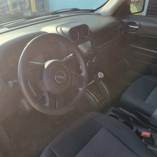 2012 Jeep Patriot Latitude driver side interior view